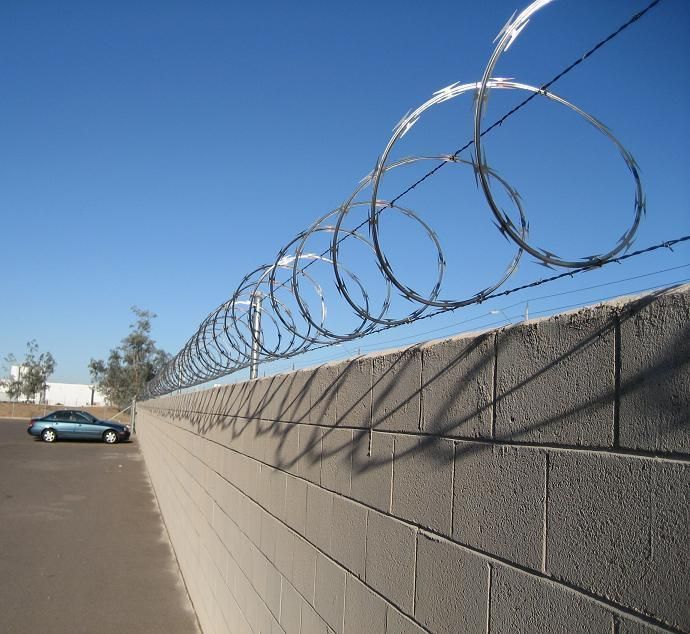 Home Boundary Wall Design with Barbed Wires