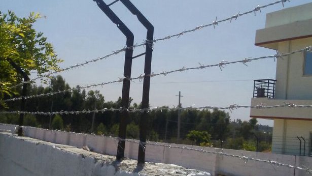 Home Boundary Wall Design with Barbed Wires