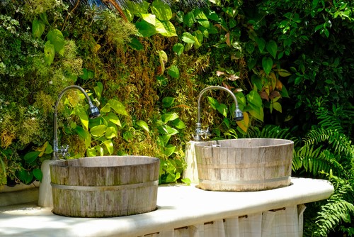 Try a rustic look with a wooden outdoor sink station