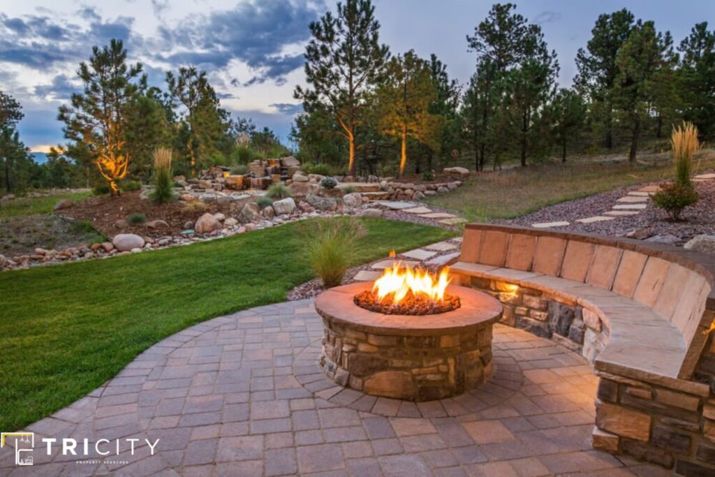 Stone Bench With Fire Pit Sloped Backyard Ideas on a Budget