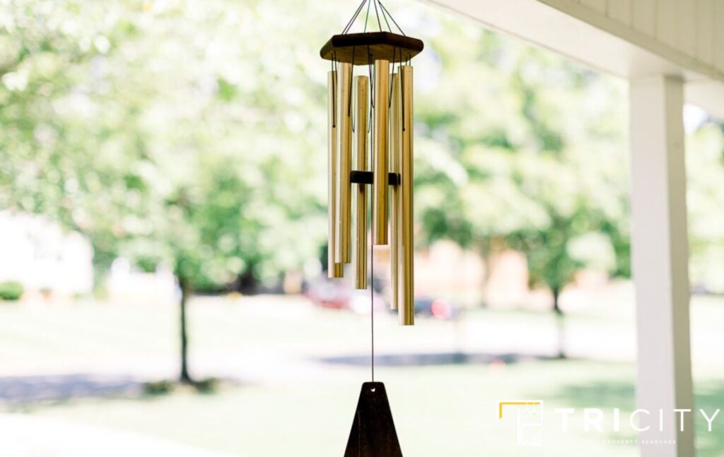 Hang Wind Chimes For Inexpensive Screen Porch Ideas on a Budget