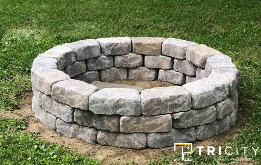 Stone Fire Pit On Grass For Country Backyard Rustic Fire Pit Ideas 